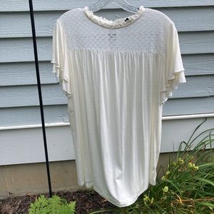 Cream colored top, size Large. Never worn.